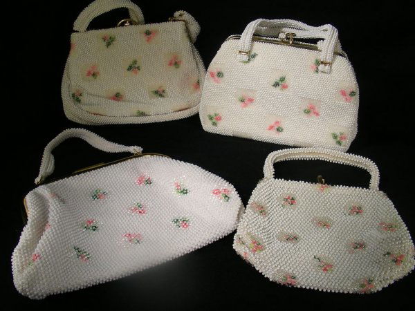 LUMURED BRAND CORDE BREAD ROSE PATTERN BAGS 4 PC: Lot # 254: LUMURED BRAND CORDE BREAD ROSE PATTERN BAGS 4 PC - Vintage 40's - 50's in white with pink and green rose leaf detail abstract all over the body. All with beaded straps and metal frames. Lar