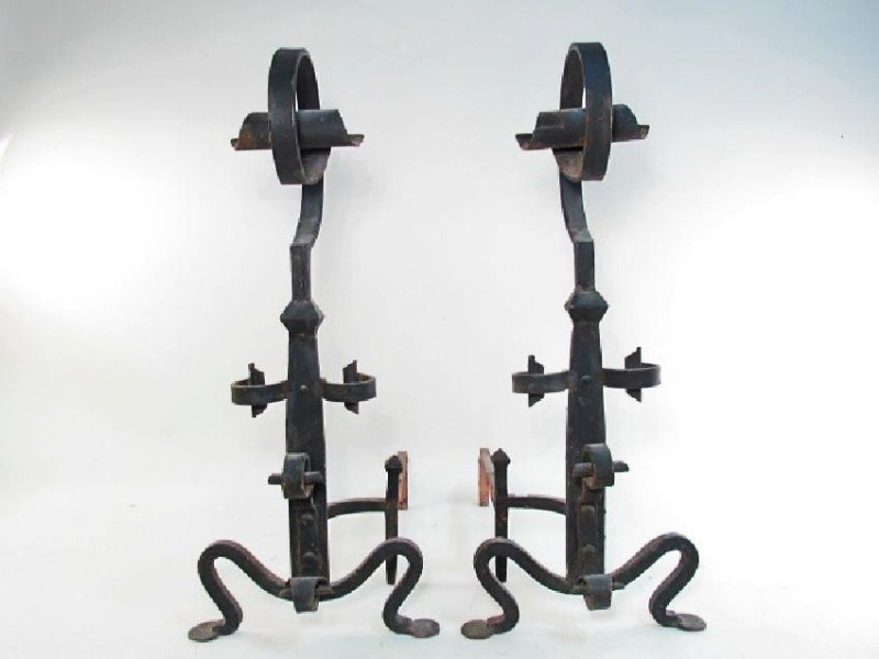 ANTIQUE WROUGHT IRON ANDIRONS: Antique wrought iron andirons measuring a total of 31.25" tall x 13.25" wide x 26" long. Condition: signs of wear and age, see images. Weight: approx. 50 lbs.