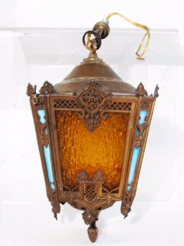 BRONZE & OPALINE GLASS COACH LANTERN: Bronze and opaline glass coach lantern measuring 12" tall x 7" wide and 7" deep. Decorated with openwork design around blue and red opaline glass panels. Condition good see images. Approx. weight: 4.5