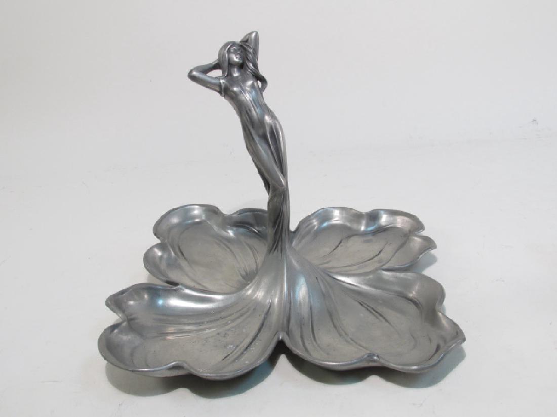 ART NOUVEAU SILVERED METAL CENTERPIECE: Art Nouveau silvered metal centerpiece of a maiden, her flowing dress to form four shaped dishes, stamped marks. Circa 1904, appears to have WMF mark on the bottom. Condition , small tear to metal, se