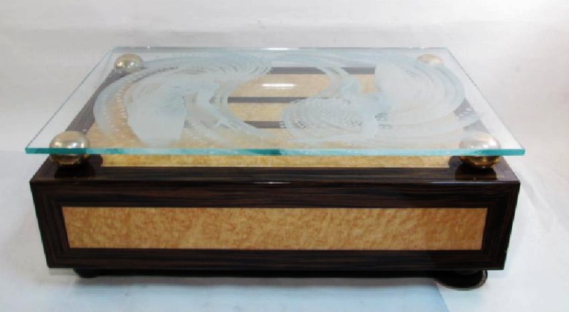 ART DECO INLAID WOOD & GLASS COCKTAIL TABLE: Art Deco inlaid wood, brass, and etched glass coffee or cocktail table. Glass etched with swirling designs and nude female forms held up by four brass balls on wood rectangular base. Measures 18" tall