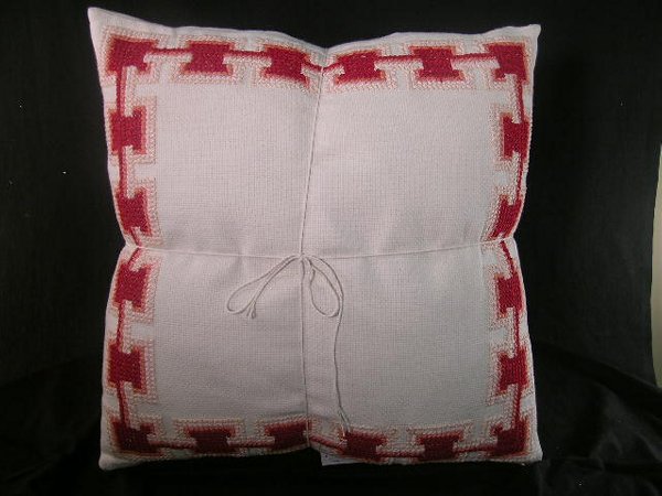 4 DKNY PINK RED THROW PILLOWS: Each measure 17" square. Good condition.