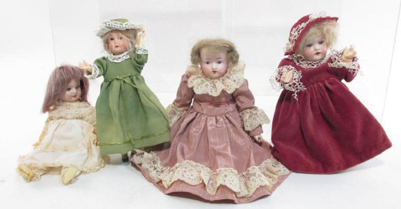 FOUR VINTAGE GERMAN PORCELAIN HEAD DOLLS (1 of 9)