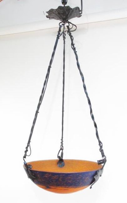 FRENCH ART DECO GLASS & IRON CHANDELIER: French Art Deco art glass and iron chandelier in the manner of Muller Freres, ca. 1930s. The bowl in orange to mottled cobalt blue Pate de Verre glass on wrought iron supports terminating in trefoil l