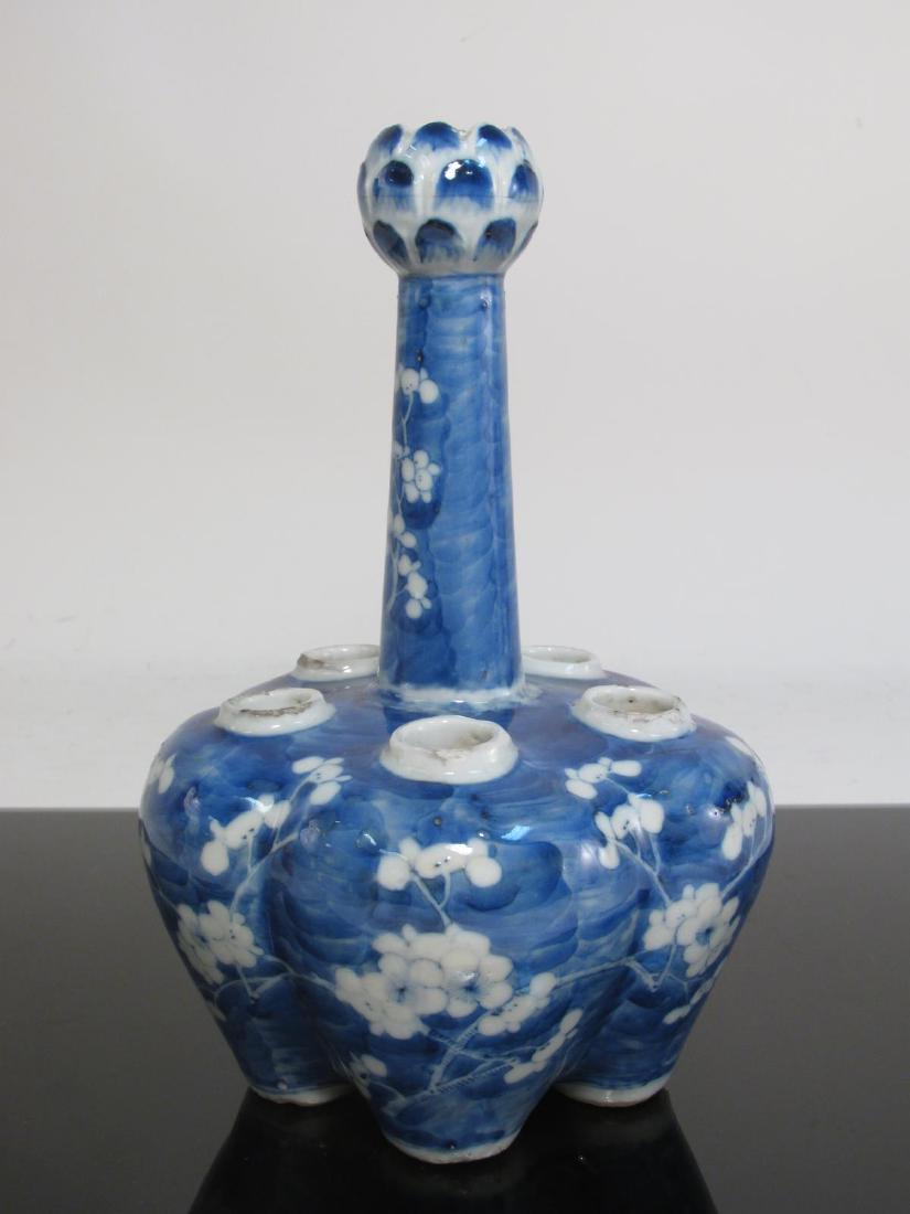 CHINESE QING DYNASTY PORCELAIN PRUNUS TULIP VASE: Chinese Qing Dynasty porcelain blue and white prunus tulip vase measuring 10" tall x 6.4" wide. Marked with four characters mark on base. Condition: minor fritting near rims, and base rims, small flak