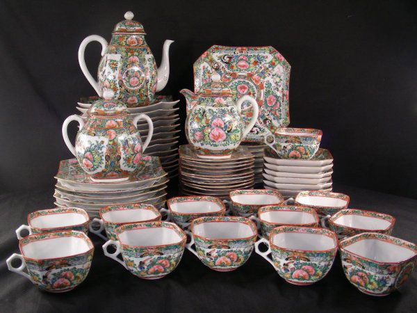 CHINESE ROSE MEDALLION PORCELAIN SET 70 PCS: Includes 15 plates at 8" square, 15 salad plates, 13 cups at 2 1/4" tall x 4" wide, 15 saucers at 5" square, 9 sauce dishes at 4 3/4", 1 teapot at 8 1/2" tall x 8" wide, covered creamer at 5 3/4" tall