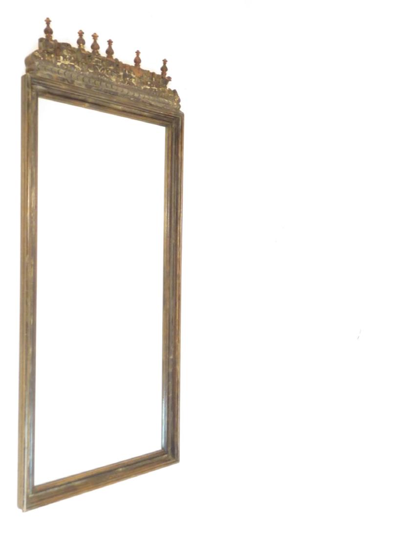 ANTIQUE INDO-ASIAN CARVED WOOD WALL MIRROR: Antique Indo-Asian carved wood wall mirror measuring 45.5" tall x 18" wide x 1.75" deep. Condition: some losses to top, signs of age, see images. Weight: 19 lbs.