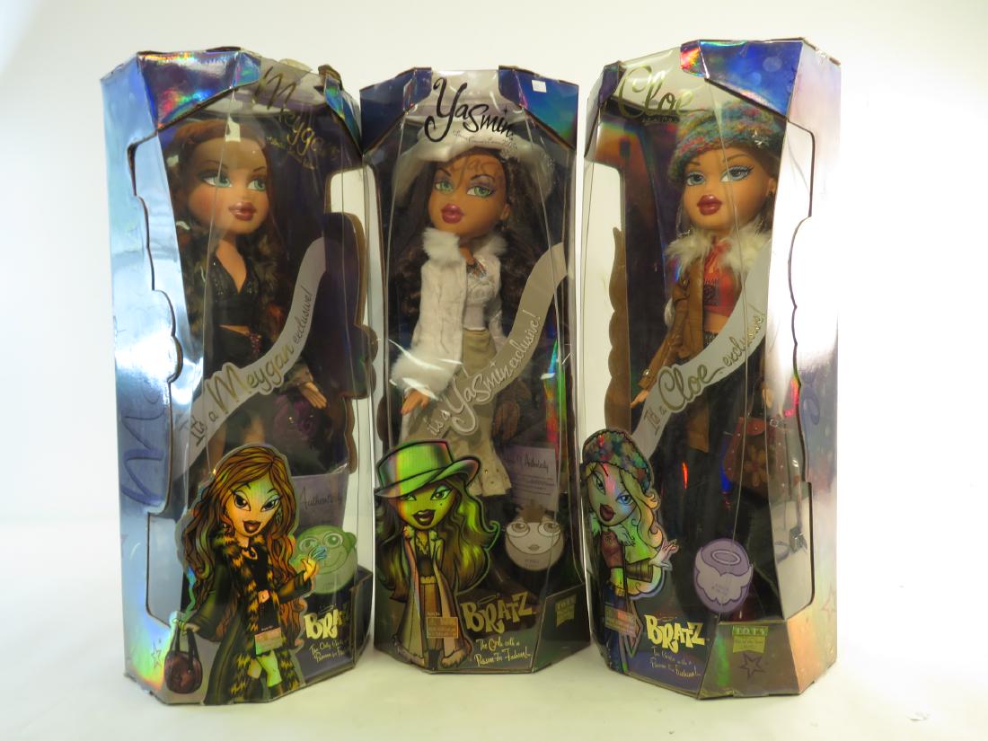 THREE 24" LARGE BRATZ LIMITED EDITION DOLLS: Three 24" Large bratz limited edition dolls. Featuring meygan, chloe, & yasmin. Condition: one box shows heavy handling, appears no boxes have been opened. Doll Box measures: Height 26" x 10" x 10". C