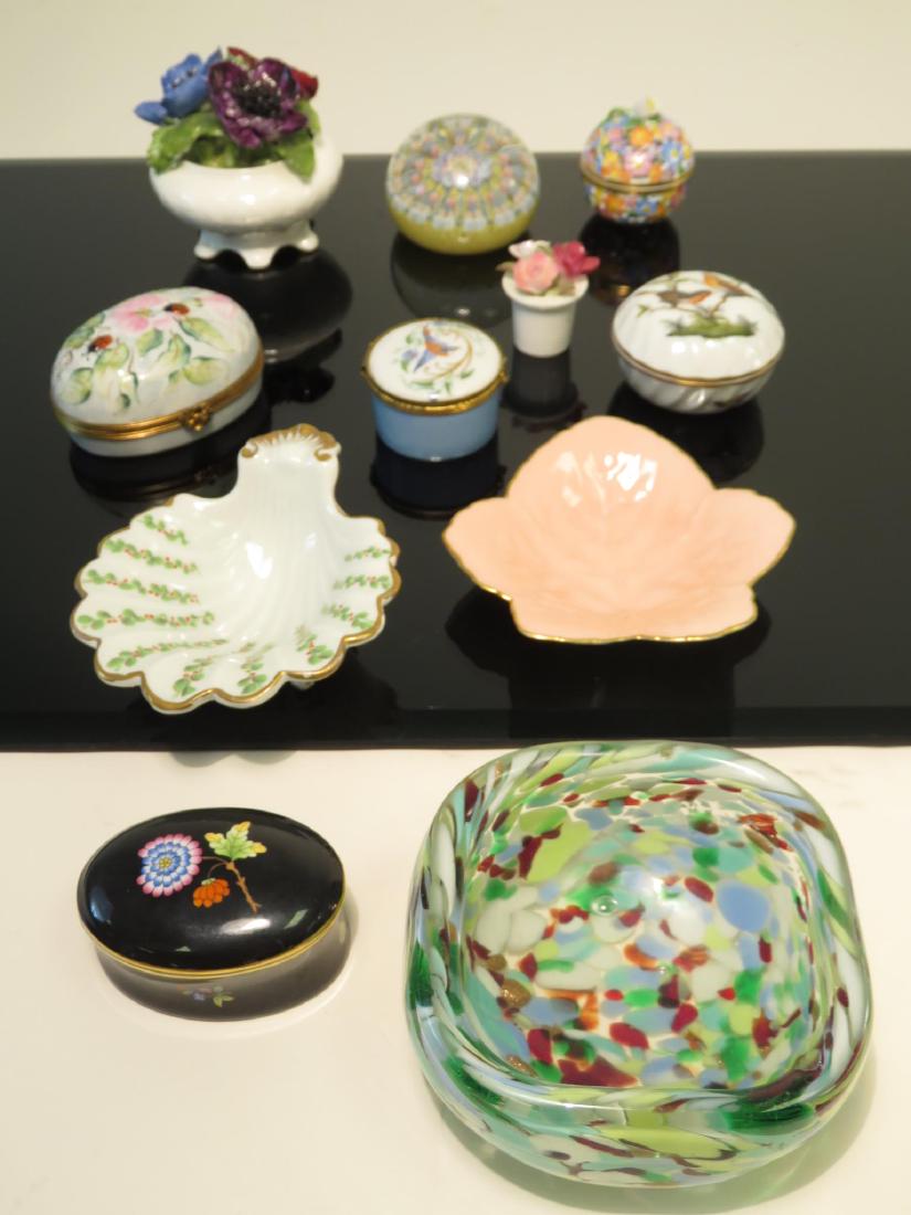 LARGE LOT OF 11 GLASS AND PORCELAIN ACCESSORIES: Large lot of 11 glass, china, and porcelain accessories. Includes Murano glass candy bowl 4.5" sq. , Colorful Perthshire paperweight -3" dia., 5 pretty porcelain pill boxes (three Herend and two Limog
