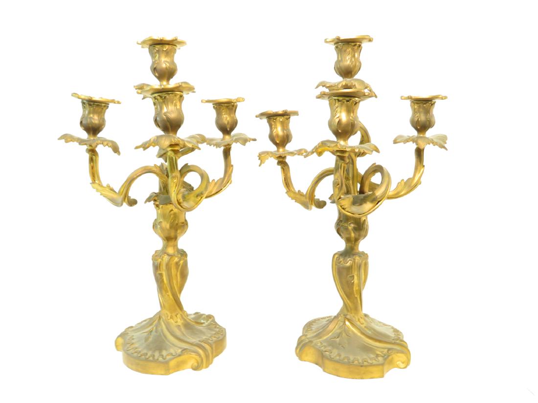 PAIR OF FRENCH ART NOUVEAU BRONZE CANDELABRA: Pair of French Art Nouveau bronze four light candelabra, each measuring 13.5" tall. Condition: socket sleeves missing, wires have been cut at base, lamp hardware removed, wear to gilded finish. See im
