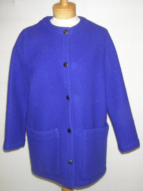 GUY LAROCHE PARIS BOUTIQUE BLUE WOOL CAR COAT: Boiled wool size 38 deep purple blue car coat. Sleeves 22" long, inner seam 18" long and back is 30" to hem. Patch pockets on front and 5 snap button closure.