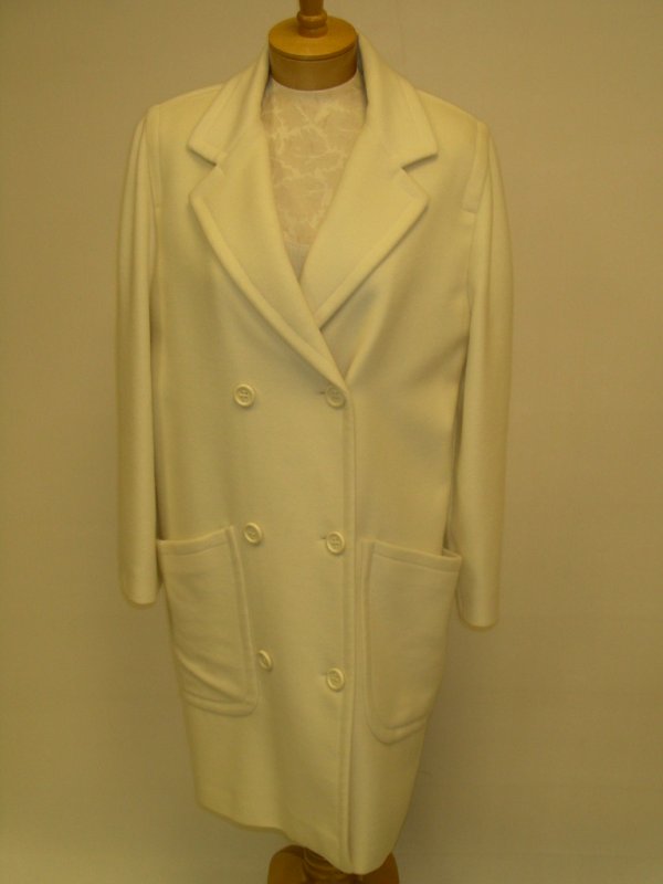 GUY LAROCHE FRENCH CASHMERE & WOOL DRESS COAT: Double breasted soft off white coat with patch pockets and yoke in back. Sleeves are 23" long, side seam 27" and back is 38" long.