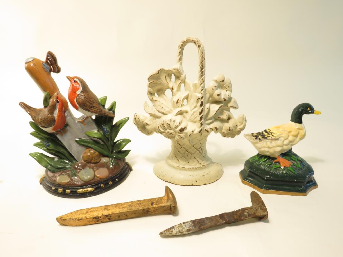 THREE CAST IRON DOOR STOPS & ... (1 of 6)