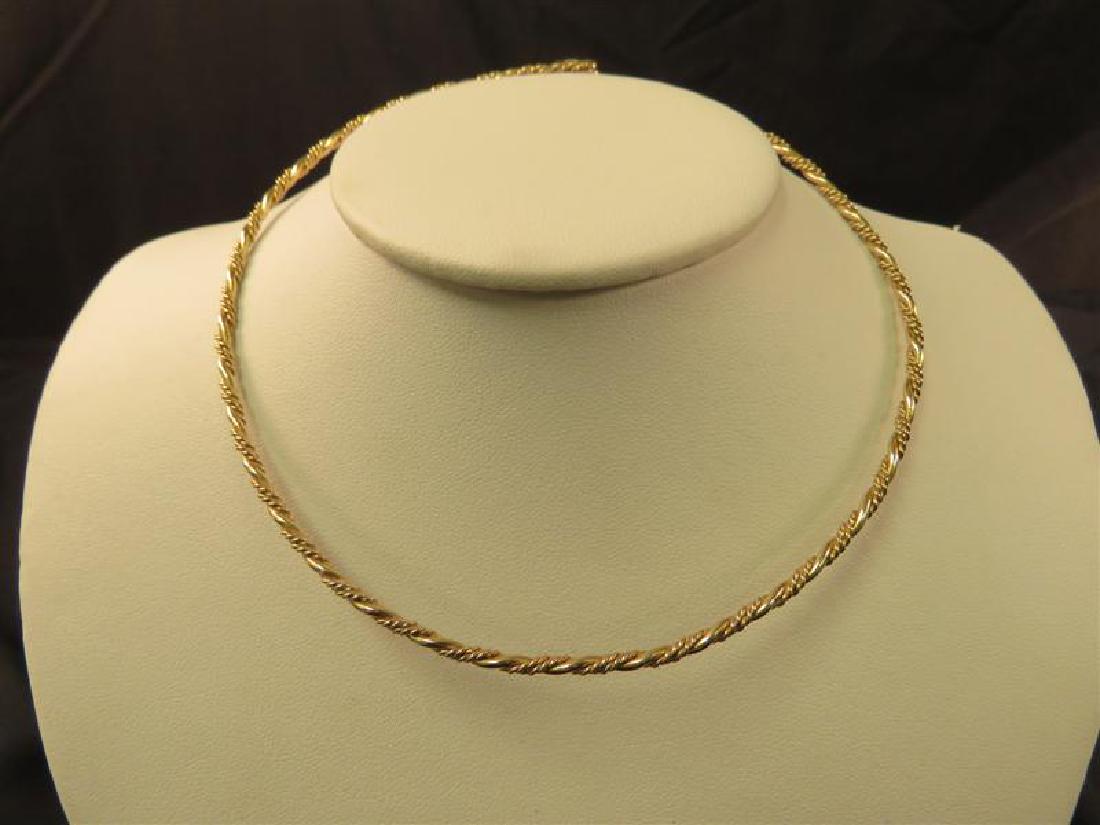 LADIES 14K YELLOW GOLD CHOKER NECKLACE: Ladies 14k yellow gold choker necklace - 16.9 grams. Approx. length 14.75", width 2mm. Condition: good.