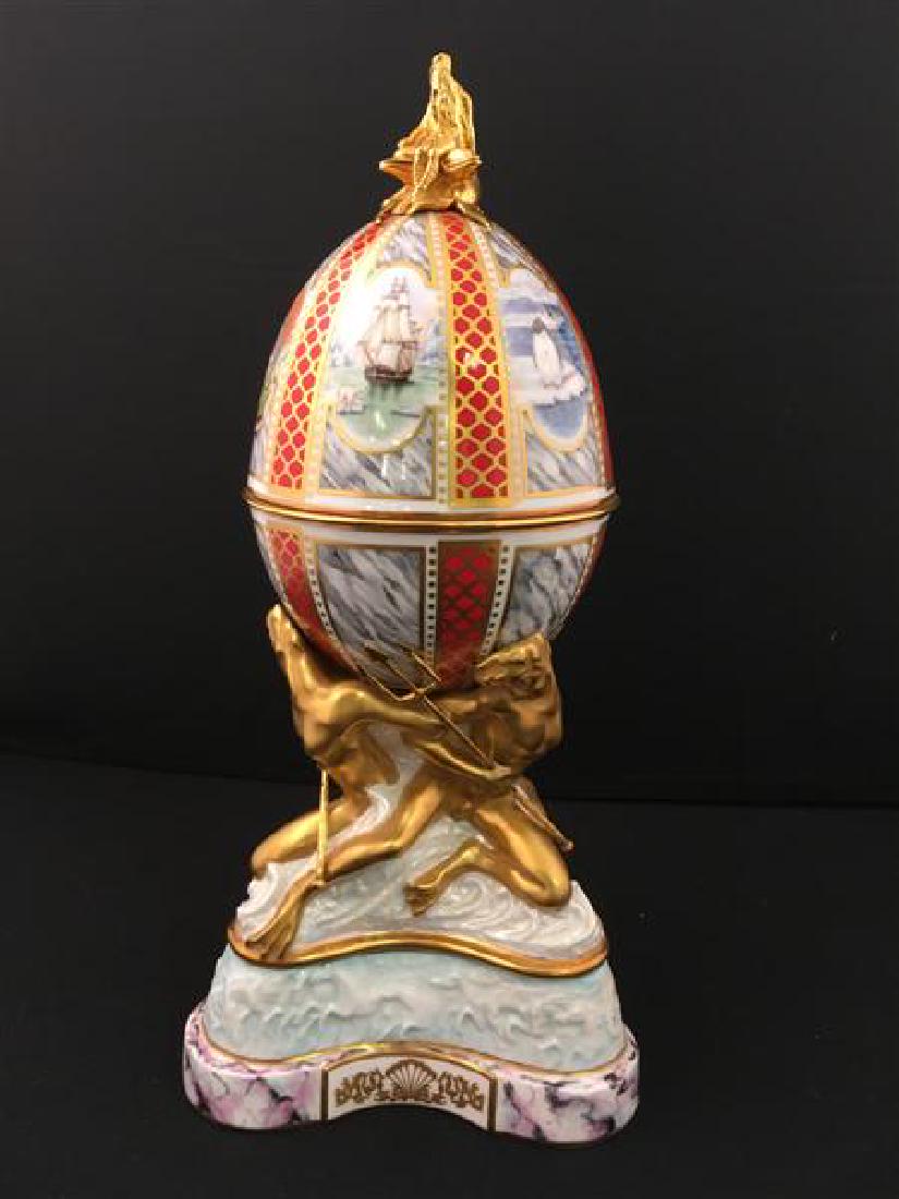RARE ROYAL WORCESTER OCEANIC EGG: Royal Worcester RARE OCEANIC EGG with Hallmarked silver Gilt mounts Modeled By Kenneth Potts issued 1986 in a Limited Edition of 50 this is Number 10 The Cover decorated with scenes at Sea, lifting of