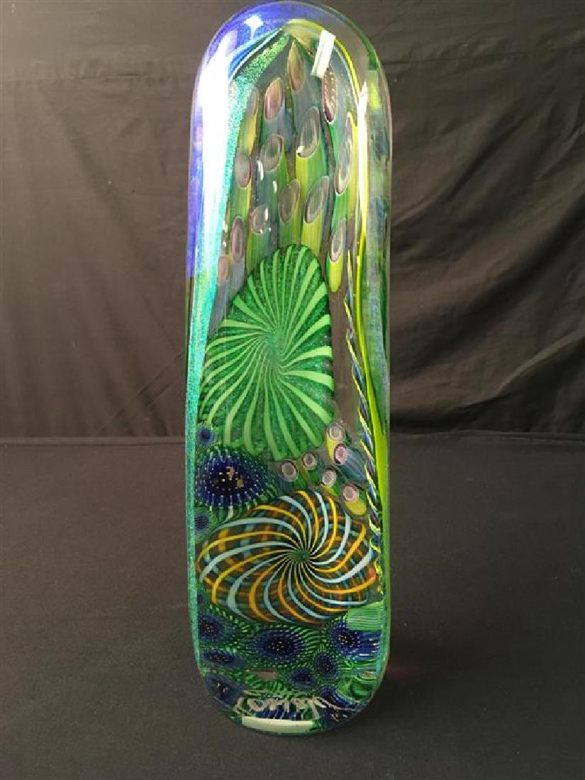 JAMES NOWAK MONUMENTAL ART GLASS PAPERWEIGHT: James Nowak (U.S. 1956 -) very large art glass paperweight or doorstop. Measures 14" tall x 5" x 4". Signed on base, "Nowak 6/07" with original price label $1,299.00. Approx. weight 5.5 lbs.