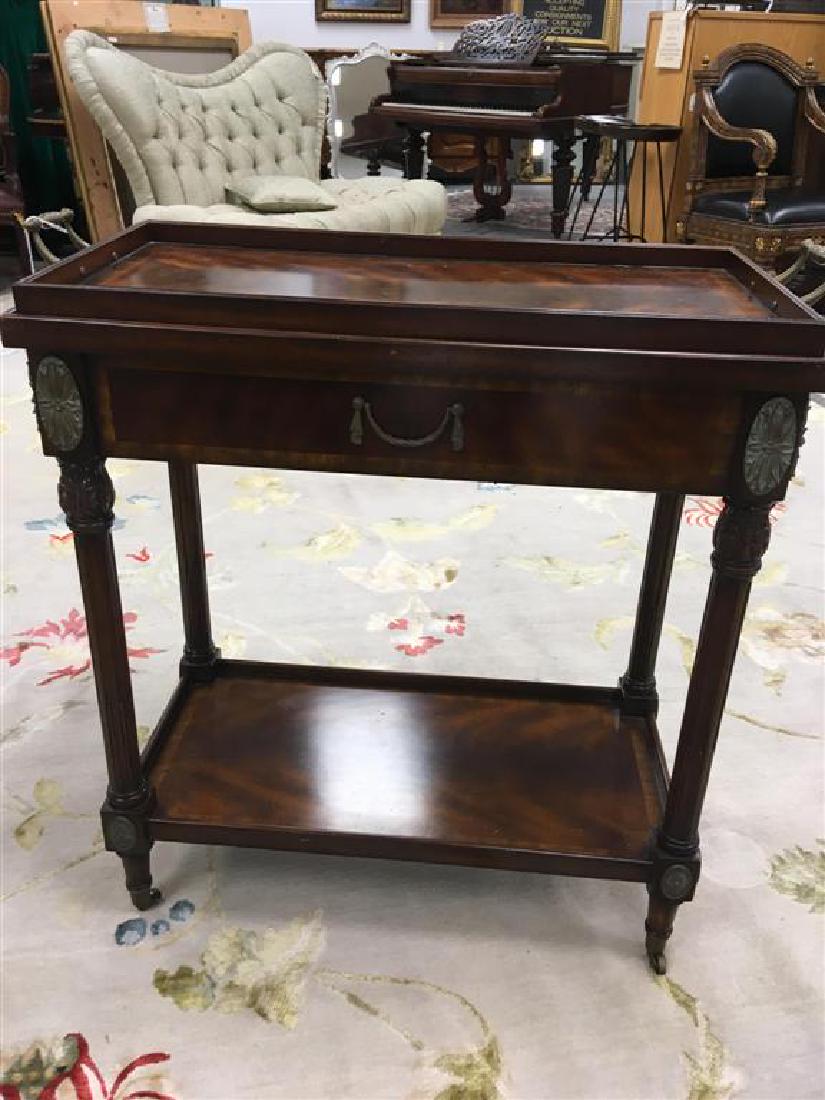MAITLAND-SMITH OCCASIONAL TABLE W/ TRAY: Maitland-Smith tray table: Regency style mahogany and crotch mahogany veneer, item number 3030-609, removable tray top above a single drawer, shelf stretcher. H 32", W 15", L 30":