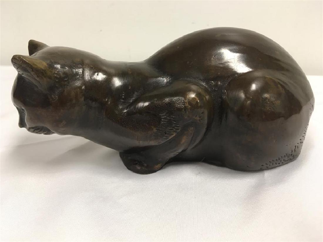 MAITLAND-SMITH BRONZE CAT: A Maitland-Smith bronze crouching cat. Measures 9" long.