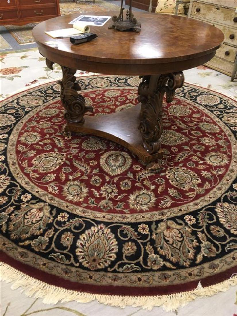 HAND KNOTTED WOOL & COTTON CIRCULAR RUG 8'3" DIA: Hand knotted wool & cotton circular area rug measuring 8'3" in diameter. Wool pile on cotton foundation. Condition: good, no wear, see images. Weight: approx. 50 lbs.