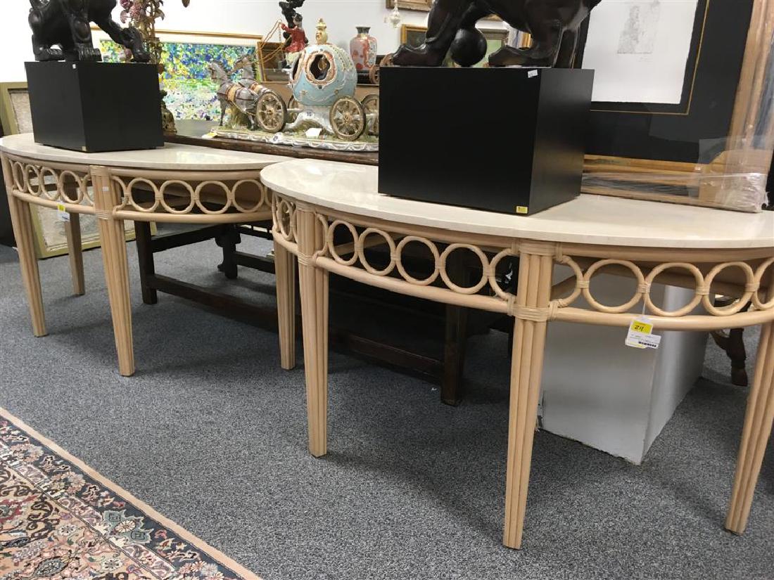 MCGUIRE RATTAN & TRAVERTINE DEMILUNE TABLE: McGuire Rattan & travertine demilune table measuring 31.75" tall x 62" wide x 23" deep. Tag affixed under frame. Condition: good, see images. Weight: approx. 75 lbs.