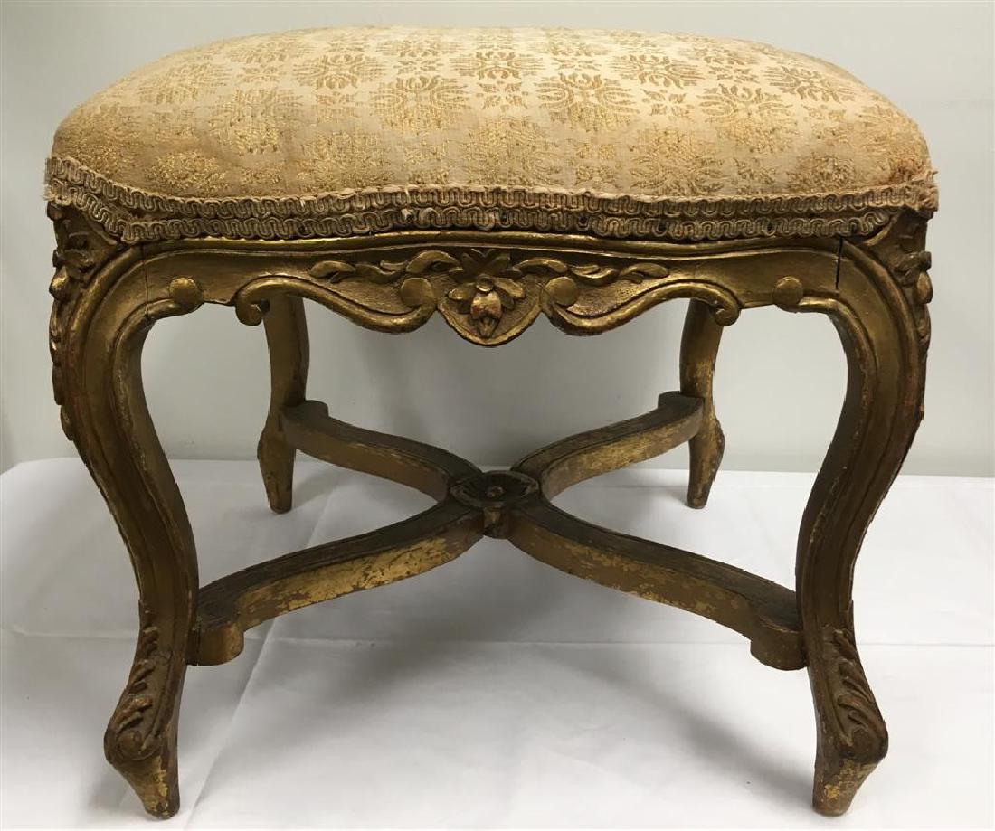 19TH C LOUIS XVI STYLE GILTWOOD FOOTSTOOL OTTOMAN: 19th century Louis XVI style giltwood hassock, footstool or ottoman. Measures 18" tall x 21" wide x 21". Condition: signs of expected age and wear to frame and fabric, could use re upholstery, possibl