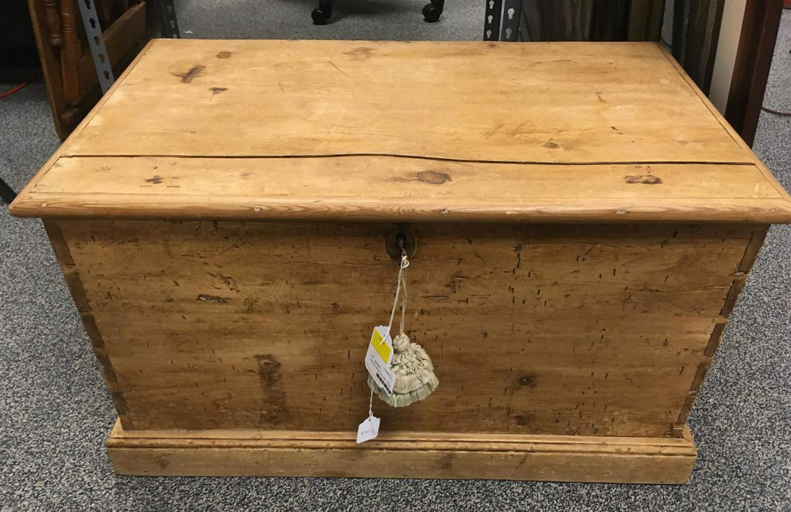 ANTIQUE PRIMITIVE PINE CHEST: Antique primitive carved pine chest measuring 29.5" wide x 18.2" deep and 16.5" tall. Condition: as-is, split to top, see images. Weight: approx. 45 lbs.