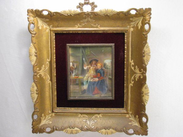 ANTIQUE HAND PAINTED MINIATURE INTERIOR SCENE: Depicts a family in a bed chamber. Painted on celluloid. Pen notation on reverse in Italian. In elaborate gilt wood carved frame. Miniature measures 4" by 3 1/2", framed dimensions are 9" by 8 1/2" an
