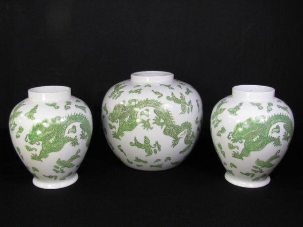 HAND PAINTED PORCELAIN JAPANESE DRAGON JARS 3 PCS: Three hand painted porcelain ginger jars with dragons. No lids Largest vase measures 6 1/2" high by 7 1/4" wide by 7 1/4" deep. Smallest measures 6" high by 5" wide. No chips, cracks or crazing, minor