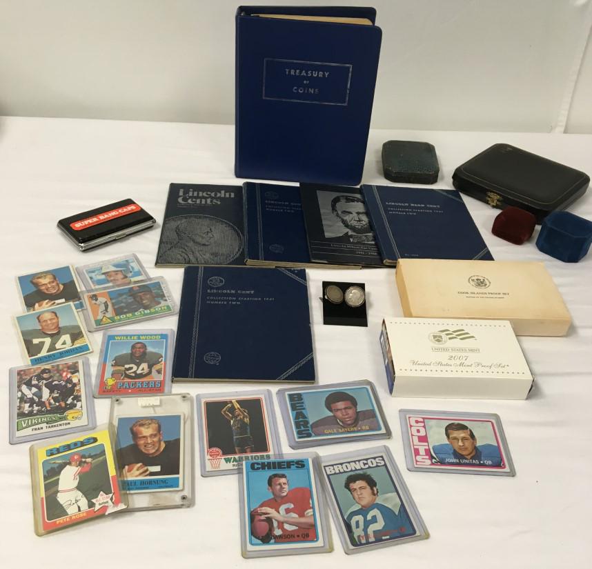 COLLECTABLES: COINS, SPORTS CARDS, CAP GUN ETC: Lot of assorted collectables: includes coin sets, coin cufflinks, assorted sports cards (baseball & football), mint sets, a Special Agent 700 miniature cap gun with caps, mini handcuffs, and more. Con