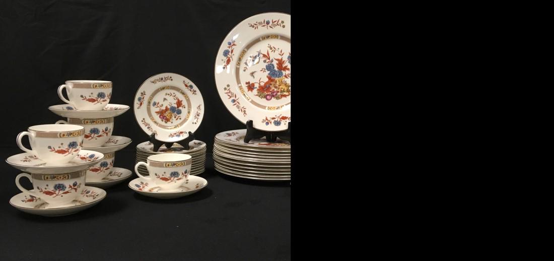 WEDGWOOD "JAMESTOWN" PORCELAIN DINNERWARE FOR 12: Wedgwood "Jamestown" porcelain dinnerware service for 12. Includes (12) 10.75" plates, (12) 8" plates, (12) 6" plates, (12) 5.75" saucers, and (12) cups. Condition: soiling to some- could use a cleani