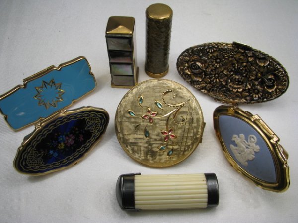 EIGHT VINTAGE COLLECTIBLE COMPACT LIPSTICK CASES