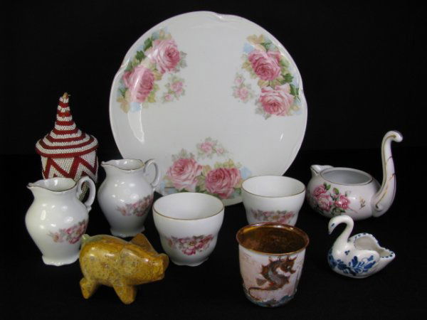 ESTATE LOT PORCELAIN ETC. 10 PIECES: Assorted porcelain miscellaneous box lot. 'Lefton" tea pot, "Bavaria", creamers and sugars and dinner plate with rose pattern "Louise", stone pig, candy cane, red and white beaded basket dinner plate