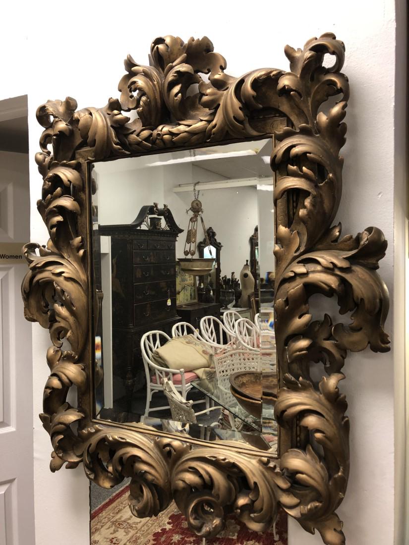 ANTIQUE 19TH C BAROQUE STYLE GILDED FRAME MIRROR: Antique 19th century Baroque style gilded frame wall mirror measuring 38" tall x 43" wide. Condition: scattered minor losses and repairs, signs of age and wear, replaced glass, see images. Weight: app