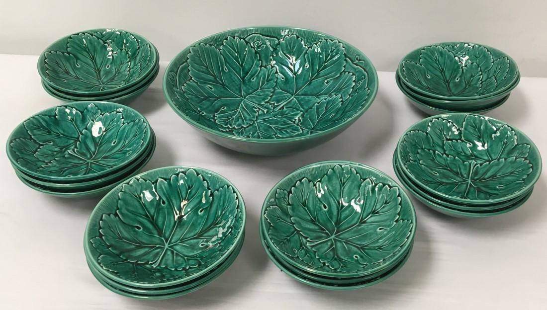 WEDGWOOD GREEN GLAZED DINNERWARE, GERANIUM ETC: Lot of assorted Wedgwood green glazed dinnerware, mostly Geranium. Includes (18) 6" bowls, (20) 8" plates, and (1) large 11" diameter bowl. Condition: 6" bowls: three with crazing to underside, one wi