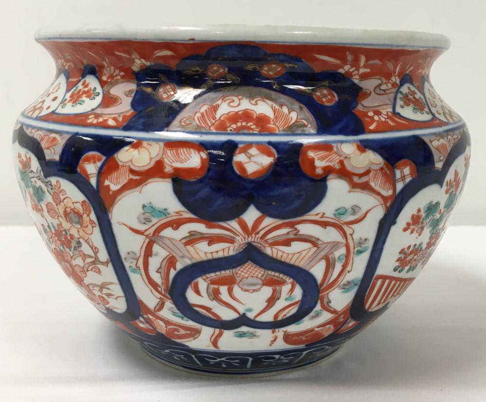 LATE MEIJI JAPANESE IMARI PORCELAIN POT: Late Meiji period Imari porcelain pot measuring 6.75" tall x 9.75" wide. Underglaze blue and overglaze enamels. Unsigned. Condition: no chips or cracks, minor wear to gilding in areas, see images. Wei