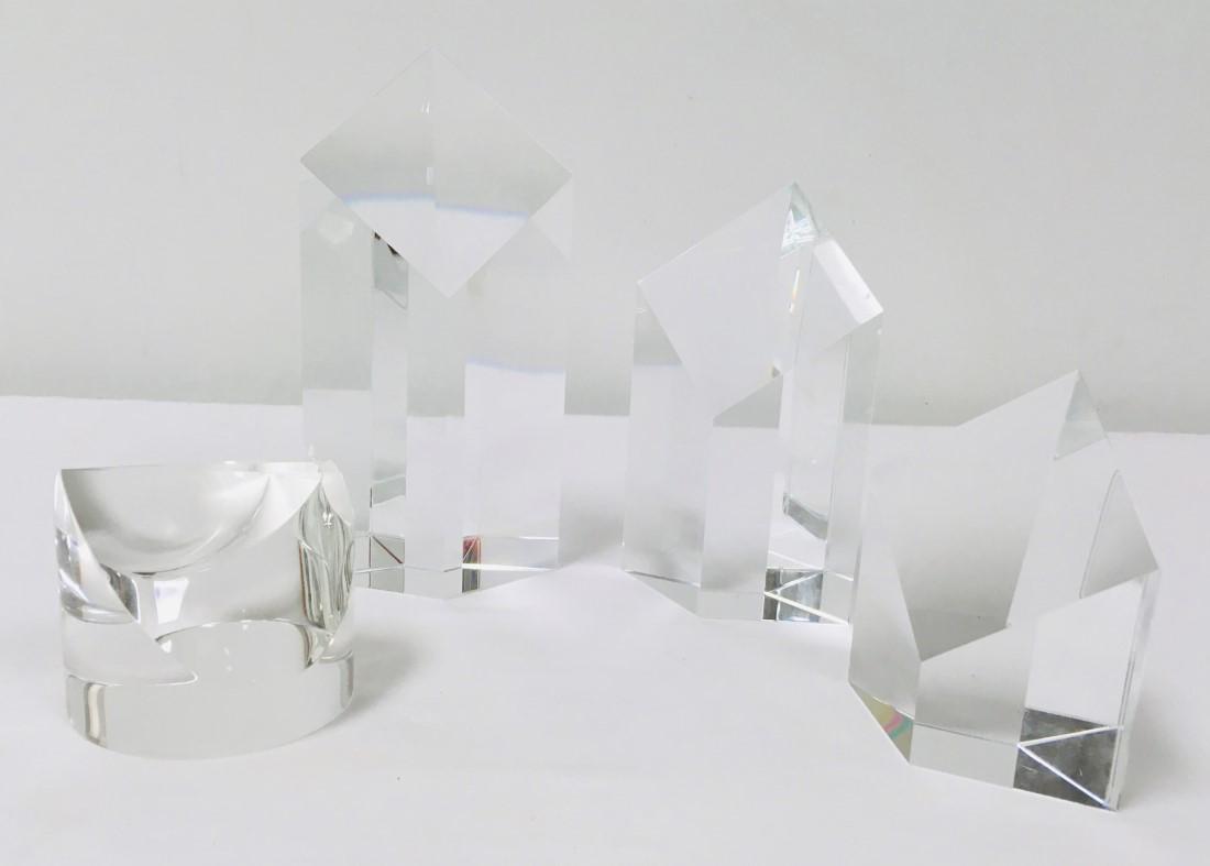 HOYA & CORREIA OPTICAL CRYSTAL PRISM PAPERWEIGHTS: Lot of four optical crystal prism paperweights. Includes three graduated sizes by Hoya, and one by Steven Correia. All signed, Correia numbered as well. Condition: good, no chips or cracks, see images