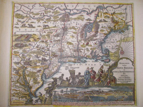 HAND COLORED ENGRAVING MAP AMERICA SEPTENTRIONALI: Hand colored engraving map titled Novi Belgii in America Septentrionali framed and matted under glass. Art is in good condition. Minor scratches to wood frame. Visual measurements 23 1/2" wide by 19 1
