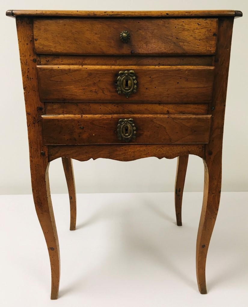 ANTIQUE FRENCH MARQUETRY INLAID SIDE TABLE: Antique 19th century French marquetry inlaid side table. Pecan, peg construction, with two lower drawers and two upper faux drawers (one on front, one on side), and one real upper drawer (right side).