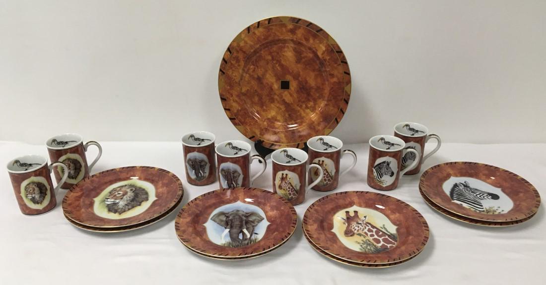 LYNN CHASE "AFRICAN PORTRAITS" DINNERWARE 17 PCS: Lynn Chase "African portraits" porcelain dinnerware. 17 pieces: (8) 9.25 plates, (8) 4" tall cups, and (1) 12" round tray. Condition: good, no chips or cracks, no signs of use, see images. Weight: 15.