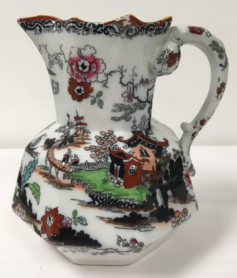 Large 19TH C MASONS IRONSTONE "PAGODA" PITCHER 11" 2/2: Antique 19th century Mason's Ironstone pearlware pitcher in the "Pagoda" pattern. Measures 11" tall. Serpent form handle. Marked on base. Condition: very minor paint loss to rim, professional restorat