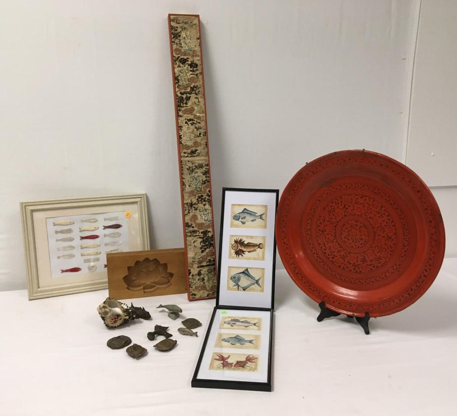ESTATE DECORATIVES / COLLECTABLES: INUIT, CHINESE,: Lot of assorted estate collectibles / decoratives. Includes a small Inuit carved stone whale by Laurent Otak, a Chinese embroidery, framed carved lures, folk art fish paintings, a red lacquer tray, Ja