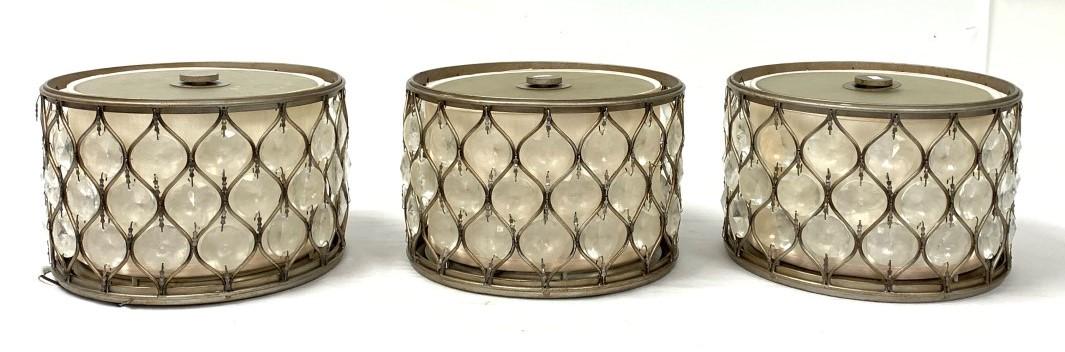 THREE CONTEMPORARY DRUM FLUSHMOUNT CHANDELIERS: Lot of three contemporary drum shaped flushmount chandeliers. Crystal prism pattern over a fabric inner shade. Condition: may need extra hardware for mounting, good condition, one of the wres holding