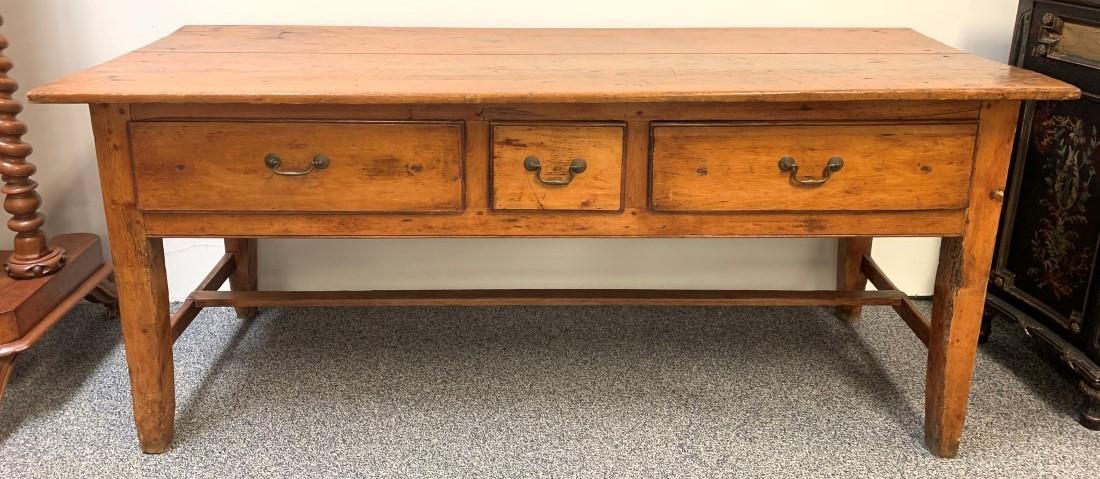 ANTIQUE PRIMITIVE STYLE CHERRYWOOD CONSOLE TABLE: Antique primitive style knotty cherry wood console table measuring 30.5" tall x 70.5" long and 27" wide. Three drawers, two larger flanking one smaller drawer. Appears to have original hardware. Condi