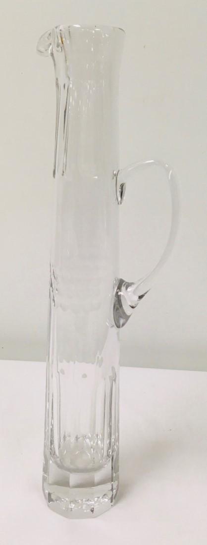 WILLIAM YEOWARD CRYSTAL TALL COCKTAIL JUG: Tall cut crystal cocktail jug by William Yeoward. Measures 19.5" tall x 6" at widest. Signed on base, William Yeoward. Condition: good without chips, cracks, or repairs.