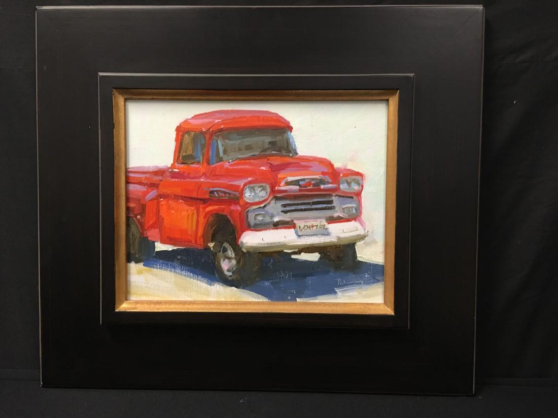 LORI PUTNAM OIL ON BOARD PAINTING: RED TRUCK: Listed Nashville, Tennessee artist Lori Putnam oil on board painting depicting a red truck. Titled on verso "Chuck would have loved this". Signed lower right. Condition: good, frame may show minor sig