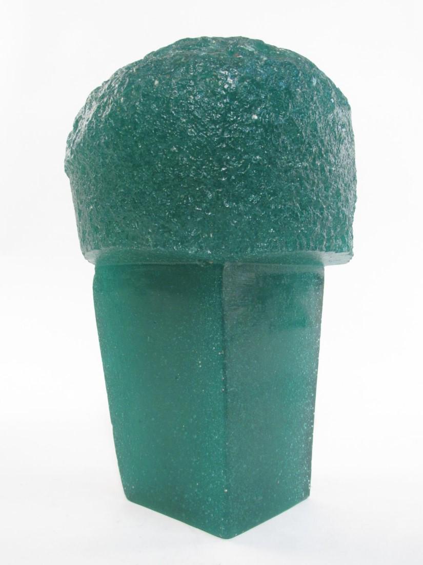 SCULPTURE BY CESAR BALDACCINI FOR DAUM: A pate de verre geometric art glass sculpture signed by Cesar Baldaccini signed Cesar and Daum, numbered what appears to be 8/50. Deep blue/green in color. Measures 8" tall x 5" x 5" at widest. Condit