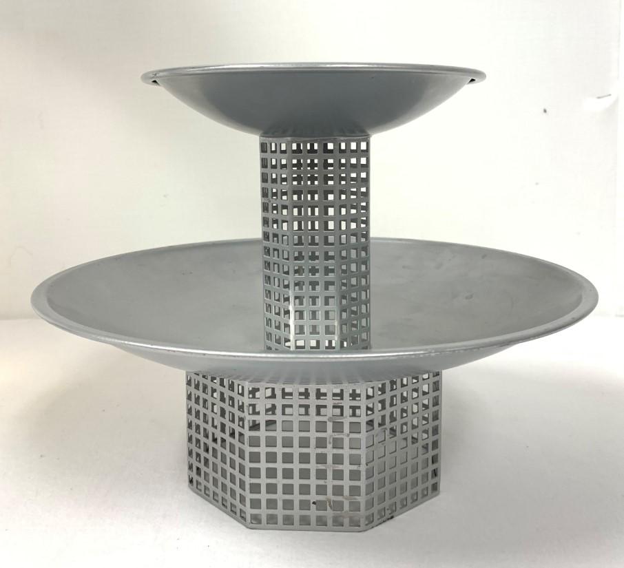 J. HOFFMAN BY BIEFFEPLAST TWO TIER METAL CENTERPIE: Josef Hoffman by Bieffeplast two tier metal fruit centerpiece. Measures 8.25" tall x 11" diameter. Marked with sticker label on base. Condition: some minor scuffs and normal signs of use to finish, se