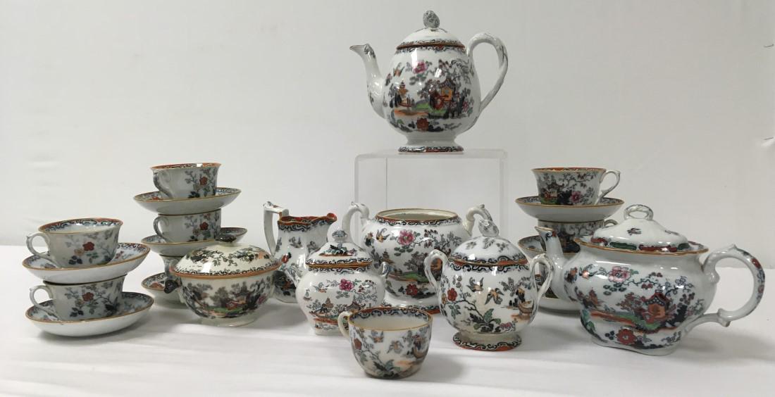 ANTIQUE 19TH C ENGLISH PAGODA IRONSTONE TEA SET: Lot of assorted antique 19th century English pagoda pattern ironstone dinnerware. Mix of Mason's and Ashworth Brothers. Includes an 8" tall teapot, a 6.25" tall low teapot, a 5.5" tall handled cache p
