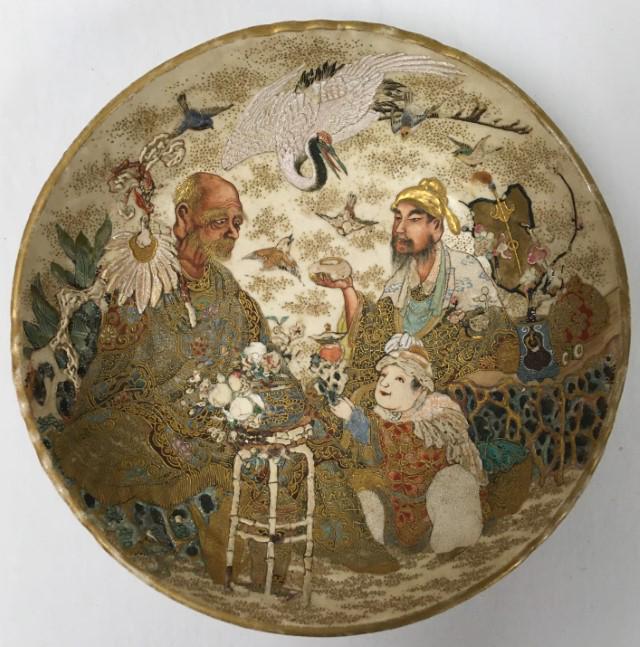 EXCEPTIONAL QUALITY 19TH C JAPANESE SATSUMA BOWL: A 19th century Japanese Satsuma bowl of exceptional quality. Unsigned. Measures 6.75" in diameter x 2" tall. Most of the white painted areas are done with a raised enamel. Condition: minor losses to r