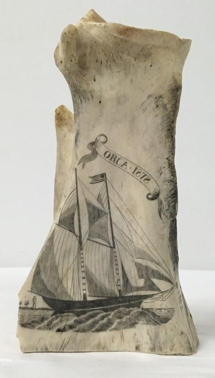 ANTIQUE WHALE BONE SCRIMSHAW CARVING "ORCA 1878": Antique whale bone scrimshaw carving depicting a two mast ship and notated "Orca 1878". Bone measures a total of 8" tall x 4.5" wide and 2.25" deep. Condition: loss to edge of bone on far left side, s